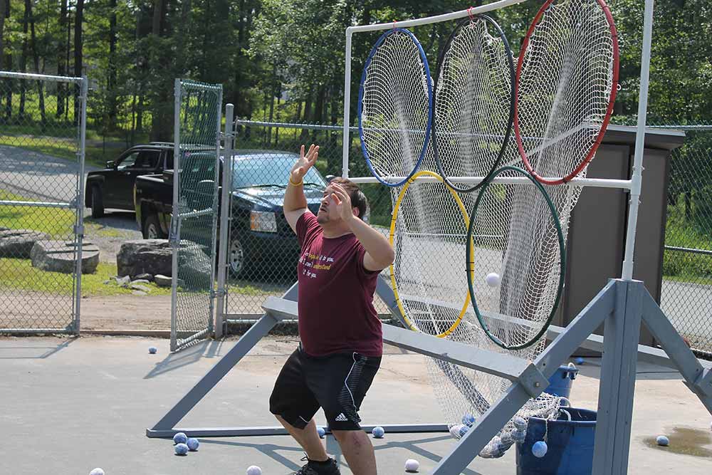 photo of guest participating in outdoor event at Woodloch Resort