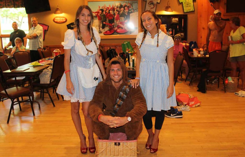 Photo of 2 women dressed as Dorothy from the Wizard of Oz and Chewbacca from Star Wars