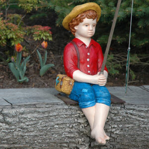 Image of boy fishing statue